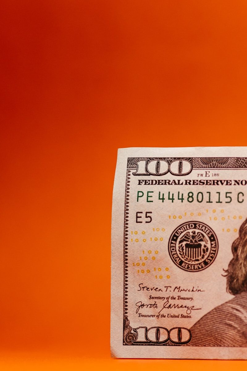 Photo by Jonathan Borba a one dollar bill with a man's face on it